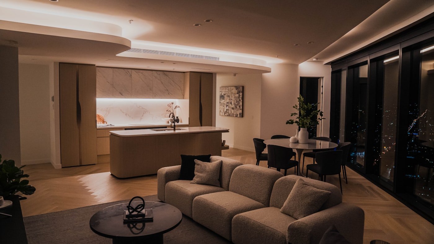 Modern Dubai apartment interior at night with city views